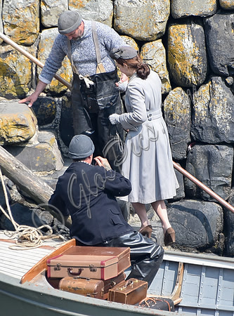 Lily James filming scenes from "Guernsey" at Clovelly Harbour