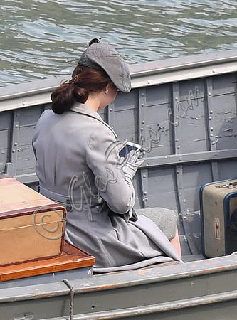Lily James filming scenes from "Guernsey" at Clovelly Harbour