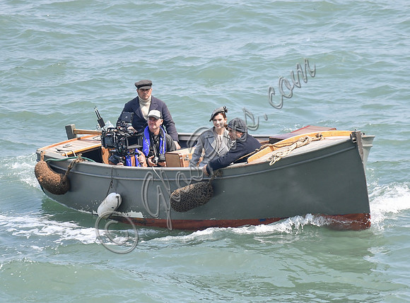 Lily James and Mike Newell filming scenes from "Guernsey" at Clovelly Harbour