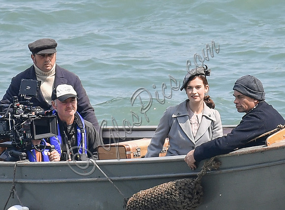 Lily James and Mike Newell filming scenes from "Guernsey" at Clovelly Harbour