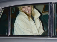 Kate Moss wearing calf length faux fur cream coat (car shot)