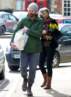 Kate Moss carrying daffodils with James Brown