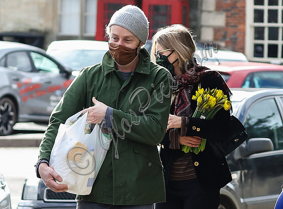 Kate Moss carrying daffodils with James Brown