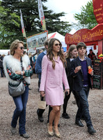 Georgia Daventry, Elizabeth Hurley, Damien Hurley walking in group amongst others.