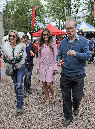 Georgia Daventry, Elizabeth Hurley and James Hervey-Bathurs walking towards camera, with Damien Hurley in background.