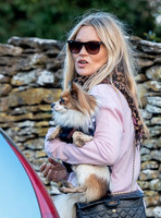 Kate Moss with dog "Stanley" under arm