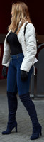 Carol Vorderman in skin tight jeans and a figure hugging black sweater