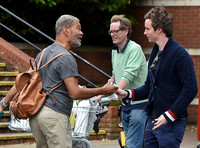 Eddie Redmayne wearing blue cardigan, skinny jeans and trainers on shopping trip to Stroud