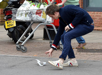 Eddie Redmayne wearing blue cardigan, skinny jeans and trainers on shopping trip to Stroud