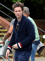 Eddie Redmayne wearing blue cardigan, skinny jeans and trainers on shopping trip to Stroud
