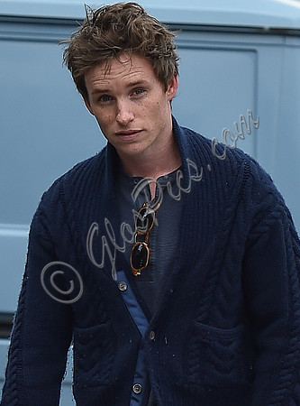 Eddie Redmayne wearing blue cardigan, skinny jeans and trainers on shopping trip to Stroud
