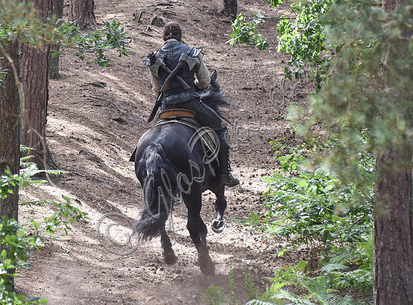 Chris Hemsworth on horseback alone