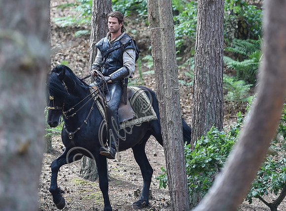 Chris Hemsworth on horseback alone