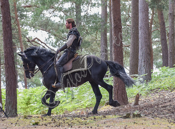 Chris Hemsworth on horseback alone