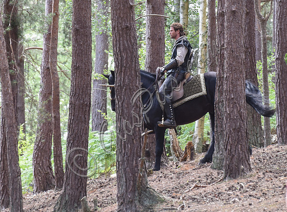 Chris Hemsworth on horseback alone