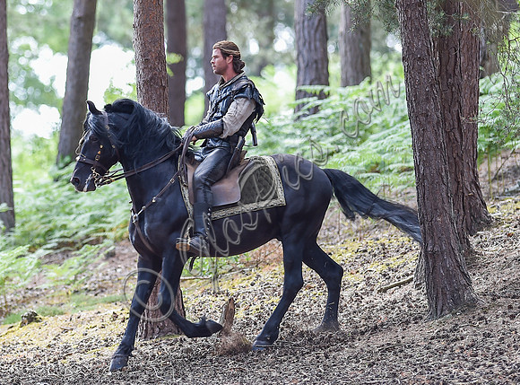 Chris Hemsworth on horseback alone