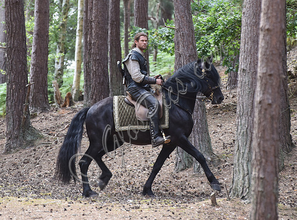 Chris Hemsworth on horseback alone