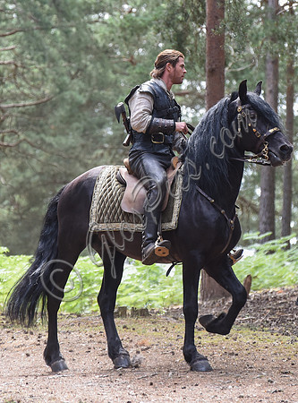 Chris Hemsworth on horseback alone