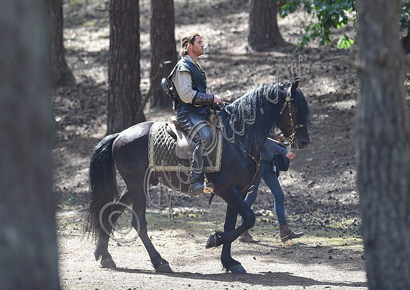 Chris Hemsworth on horseback alone