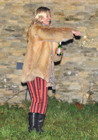 Kate  Moss with bottle of beer and a sparkler