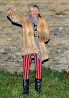 Kate  Moss with bottle of beer and a sparkler