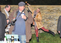 Kate  Moss with bottle of beer and a sparkler
