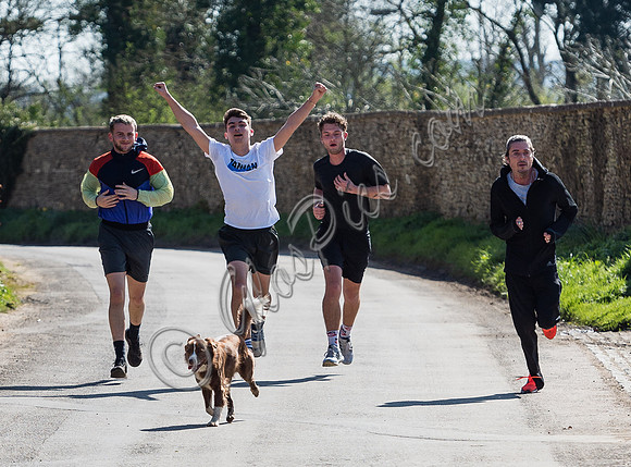 Finlay Munro Kemp, Rudy Law Rafferty Law, and Darren Strowger jogging