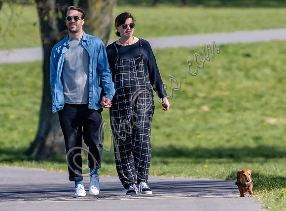 Pregnant Alexandra Roach in dungarees with husband Jack Scales