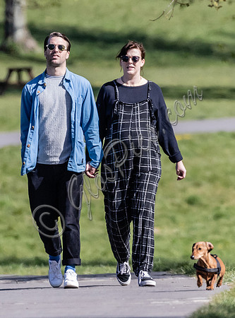 Pregnant Alexandra Roach in dungarees with husband Jack Scales