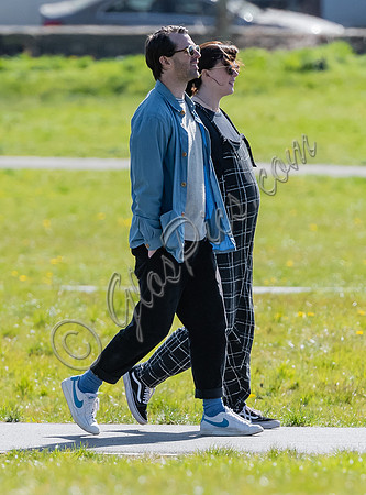 Pregnant Alexandra Roach in dungarees with husband Jack Scales
