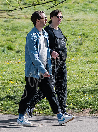 Pregnant Alexandra Roach in dungarees with husband Jack Scales