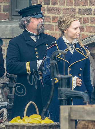 Mia Wasikowska  and cast filming scenes for "Alice in Wonderland" at Gloucester Docks