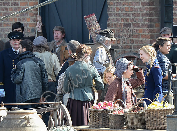 Mia Wasikowska  and cast filming scenes for "Alice in Wonderland" at Gloucester Docks
