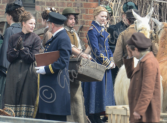 Mia Wasikowska  and cast filming scenes for "Alice in Wonderland" at Gloucester Docks