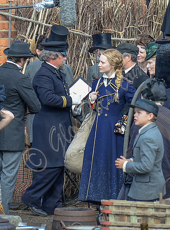 Mia Wasikowska  and cast filming scenes for "Alice in Wonderland" at Gloucester Docks
