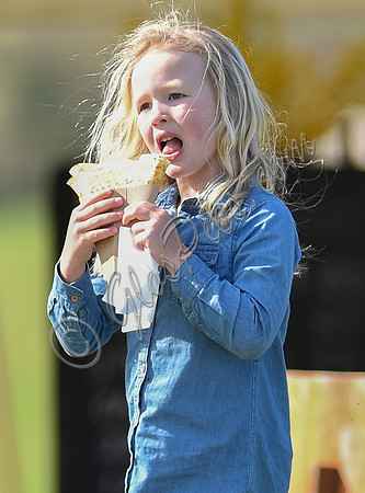 Savannah Phillips tucking into a crêpe