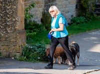 Former Tennis Star and quiz game host Sue Barker walking  her dogs