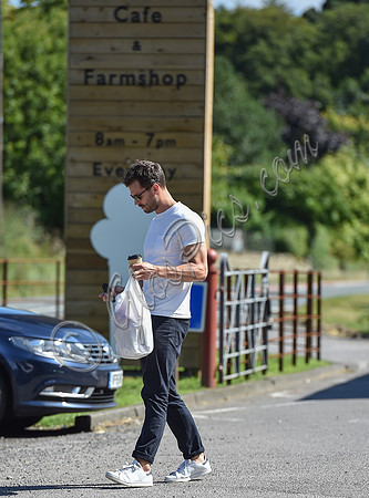 Jamie Dornan in white T shirt and Jeans