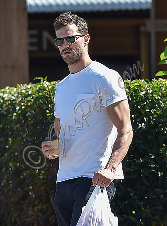 Jamie Dornan in white T shirt and Jeans