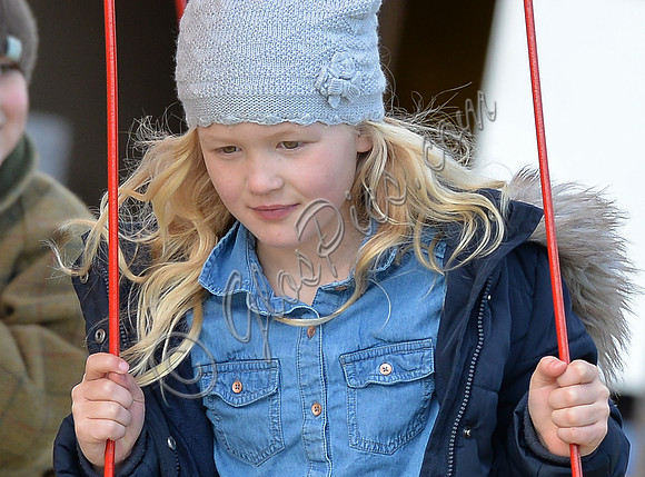 Savannah Phillips on fairground ride, close-up