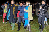 Kate Moss, John Hitchcox and Phoebe Vela looking casual at bonfire party.