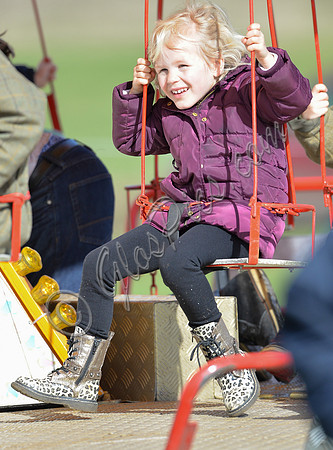Isla Phillips on fairground ride