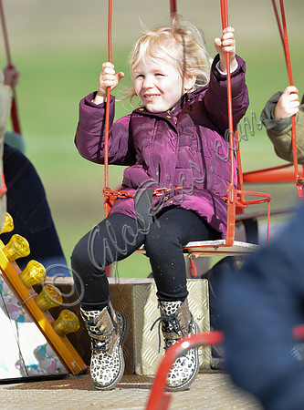 Isla Phillips on fairground ride