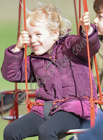 Isla Phillips on fairground ride