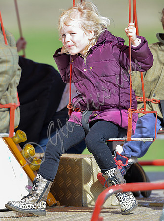 Isla Phillips on fairground ride