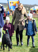 Autumn, Savannah and Isla Phillips with labrador dog