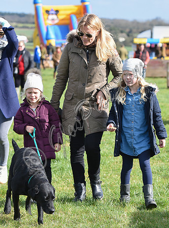 Autumn, Savannah and Isla Phillips with labrador dog