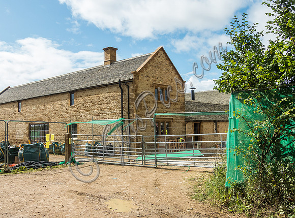 exterior building views of Beckham's triple barn conversion