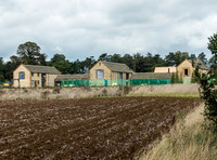 exterior building views of Beckham's triple barn conversion