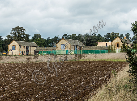 exterior building views of Beckham's triple barn conversion
